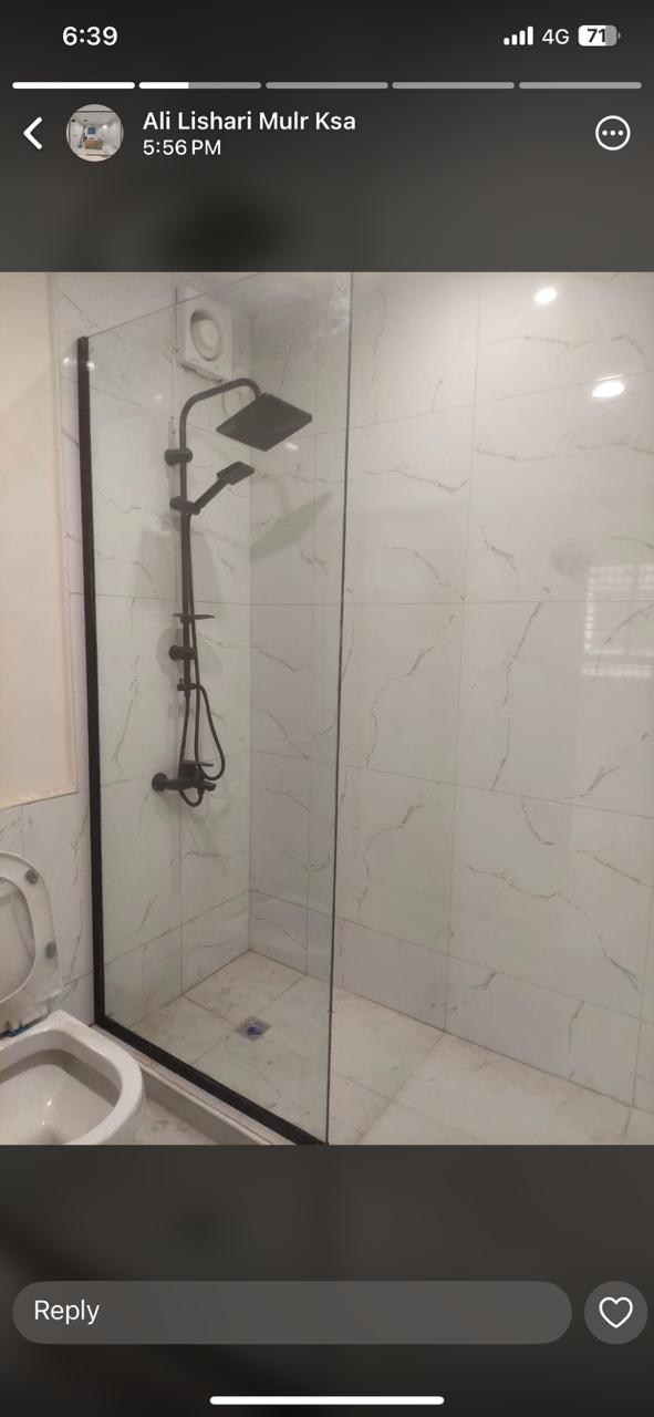 Gold-trim frosted sliding shower door